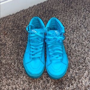 Neon blue high top vans